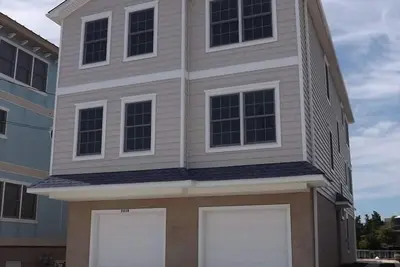 Image de Profitez de la magnifique vue sur la baie et le coucher de soleil depuis ce condo au dernier étage