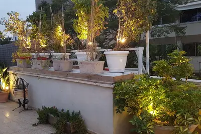 Image de Plongez dans un appartement de vacances ou d'affaires vert, Bb par séjour, à 5 min du centre