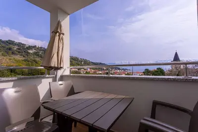 Image de Appartement de vacances avec climatisation et vue sur la mer