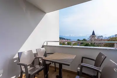 Image de Appartement de vacances avec climatisation et vue sur la mer
