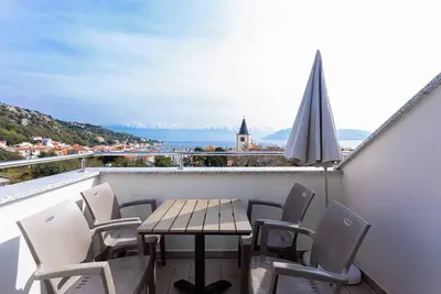 Image de Appartement de vacances avec climatisation et vue sur la mer