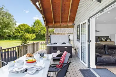 Image de Woodpecker Lodge, Ferme Redlake