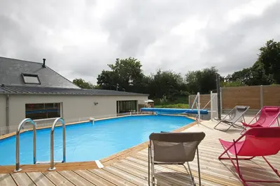 Image de Grande maison familiale avec piscine chauffée et jacuzzi, proche Parc des Marais du Cotentin.