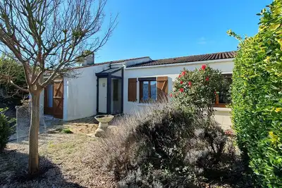 Image de Maison confortable avec jardin proche plage, 3 chambres, WiFi, animaux sur demande