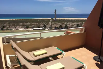 Image de Cosy et romantique appartement avec vue sur la plage, terrasse, Wifi gratuit