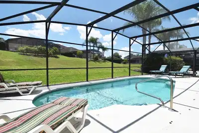 Image de Fantastique 3 chambres, 2. 5 maison de piscine de bain, restylée mai 2019, 12 miles à Disney!