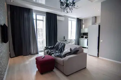 Image de Appartement au coeur de la ville avec vue sur la rue principale