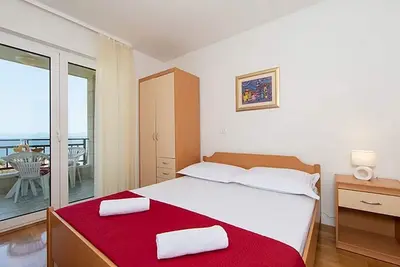 Image de Appartement de deux chambres avec la terrasse et la vue sur le mer Igrane, Makarska (A-17292-a)