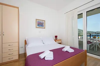 Image de Appartement de deux chambres avec la terrasse et la vue sur le mer Igrane, Makarska (A-17292-d)