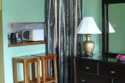 Image de Negril Beach Condo - Jamaïque - Studio, 2 lits doubles w \/ cuisine, Unité 1