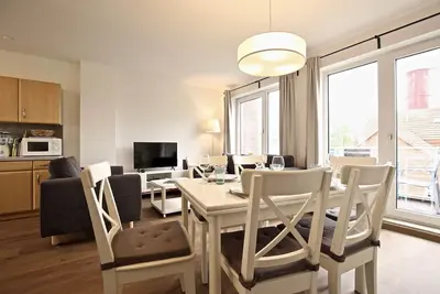 Image de duplex moderne et grand adapté aux enfants dans un emplacement privilégié avec vue sur le phare