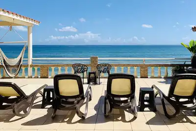 Image de Maison directement sur la plage avec de magnifiques couchers de soleil tropicaux près de Rincon