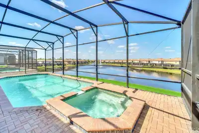 Image de Rivière Lazy de style complexe! Nouveau Pool House 9Br / 6Ba avec vue sur le lac, près de Disney