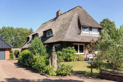 Image de Appartement dans une maison au toit de chaume à Nebel sur l'île Amrum - Internet sans fil, télévision et terrasse