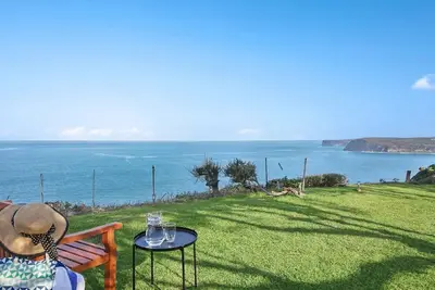 Image de Clifftop Vista à Copacabana maison de 3 chambres avec vue imprenable sur l'océan