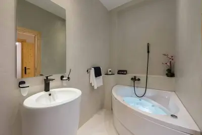 Image de Suite Supérieure avec Jacuzzi Jacuzzi \/ 7