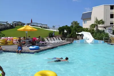 Image de Une place à la station balnéaire Family Fun! 150'Waterslide, piscine intérieure et Putt Putt