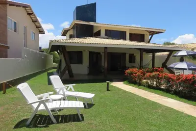 Image de Maison à Cond. Paradis, le meilleur de Guarajuba / Ba, climatisation, Wifi et piscine