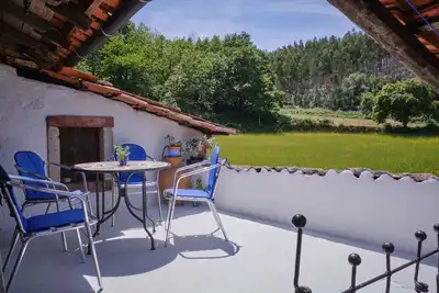 Image de Un Cottage autonome traditionnel à Quinta da Ribeira.