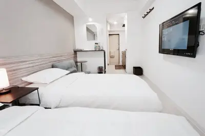 Image de 2b. Gare de Nagoya / arrêt de bus 3 minutes / grand magasin Meitetsu / Takashimaya / pharmacie / dépanneur 4 minutes / parking gratuit / 4 chambres familiales / jumelles