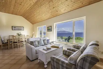 Image de Clifftop House - Des mers chatoyantes au bout du monde!