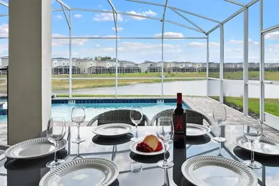 Image de Disney Home de luxe avec piscine / spa au ChampionsGate Golf Resort, vue sur le lac