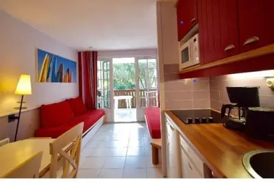 Image de Appartement pour 5 dans résidence de loisirs avec piscine, plage à pieds
