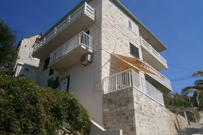 Image de Appartement de deux chambres avec le balcon et la vue sur le mer Povlja, Brac (A-17472-a)