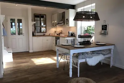 Image de Maison de rêve sur Wangerooge surplombant la mer des Wadden