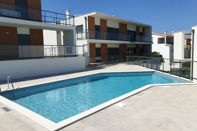 Image de Nabaía, appartement neuf au rez-de-chaussée 7-9 pers. avec vue mer à Salir do Porto