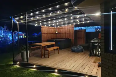 Image de Papamoa Beach Home avec section clôturée