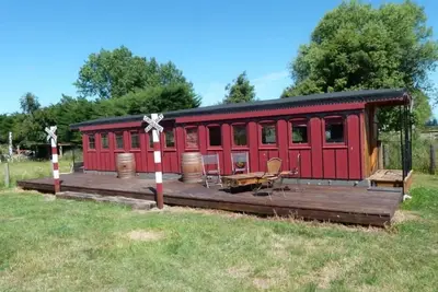 Image de 1889 wagon de train en bois - Wacky Stays - six propriétés uniques