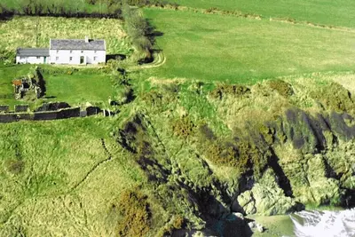 Image de Ferme en bord de mer spectaculaire du 17ème siècle avec sa propre plage