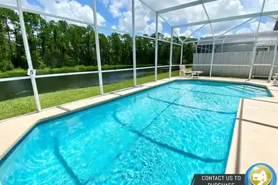 Image de Charmante maison familiale avec vue sur le lac! 4\/2. 5 w piscine