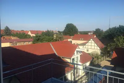 Image de Appartement moderne avec vue sur les toits de Templin