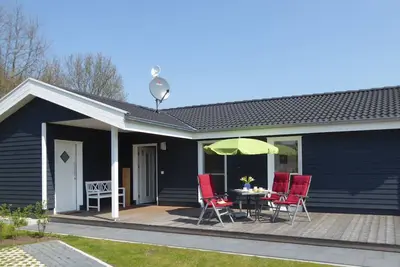 Image de Maison de vacances dans le Seepark Nordhorn avec sauna, bain à remous et cheminée