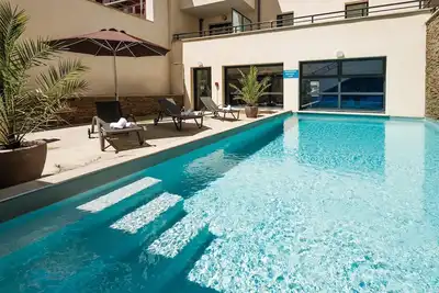 Image de Appartement cosy et charmant avec A \/ C + Wi-Fi | Un 400m des plages!