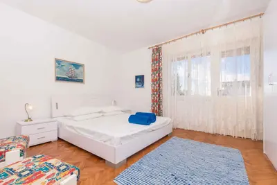 Image de Appartement de vacances avec air conditionné et balcon