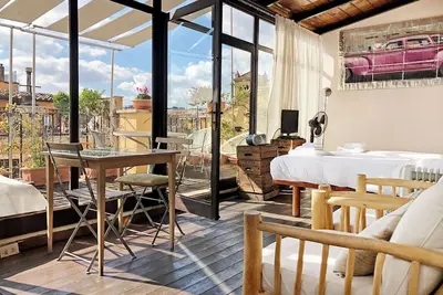 Image de W artistique de Loft. Vue spectaculaire! Terrasse romantique sur les toits de Trastevere