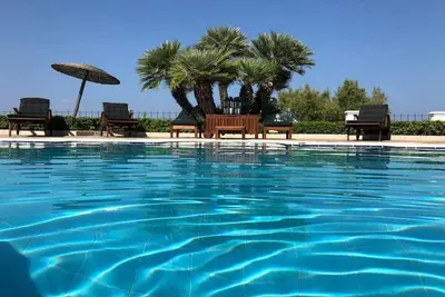 Image de Villa Dolphin - Maisonnette Front de Mer avec Piscine