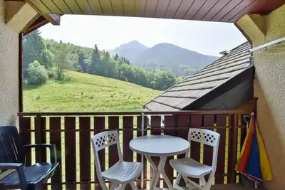 Image de Duplex montagnard cosy pour 6, près des pistes, équipé et confortable à Bernex