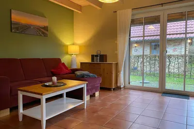 Image de Maison de campagne 4 pièces (2) avec sauna et cheminée (86m²) - Maisons de campagne Ferienhof à Mechelsdorf pr��s de Ostseebad