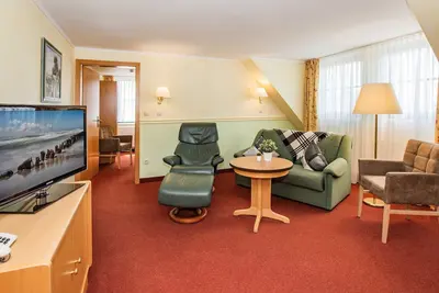 Image de 15 Suite # 2 / grande chambre double - HOTELgarni Nussbaumhof ***
