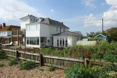 Image de The Watchhouse à Camber Sands, propriété absolue au bord de la plage.