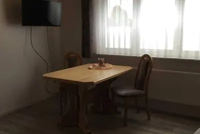 Image de Appartement 40m² Type B Rez-de-chaussée, 1 chambre à coucher, max. 4 personnes - Clôture de maison