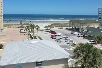 Image de Maison en bord de plage avec 2 étages