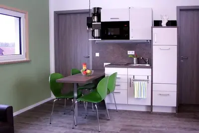 Image de Chalet (44 m2) entouré de verdure avec une connexion Wi-Fi gratuite