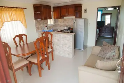 Image de Tropical Island Aparthotel - Studio Familial 1 Lit Double 1 Simple - Wi-Fi Gratuit - Ultimate One Bedroom Apartment Full Kitchen - Balcony City Views in Santo Domingo Este