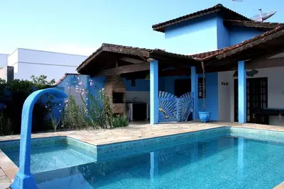 Image de Maison de plain-pied avec piscine à Condominio avec sécurité 24 h. Plage de Massaguaçu