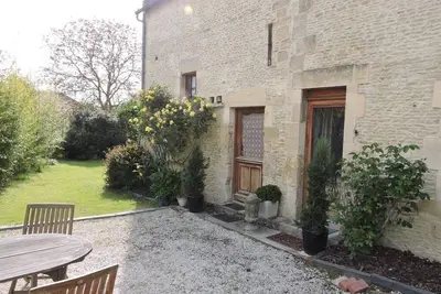 Image de Maison jumelée d'une chambre avec jardin.